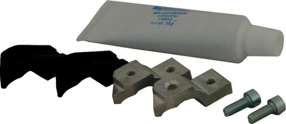 Halterungsset für Sensoren, bestehend aus zwei schwarzen Gummiteilen, einer Metallbasis, Schrauben und einer Tube mit Klebstoff, hergestellt von Wolf.